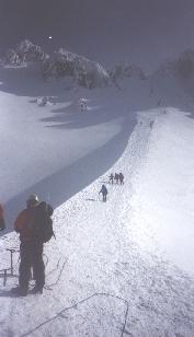 The summit lies just above the short couloir.