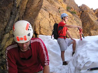 We prepare for a quick boot ski down the snow couloir from the ridge crest.